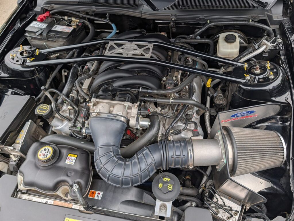 Shelby Mustang engine bay with cold-air intake during a pre-purchase inspection in Eugene, Oregon