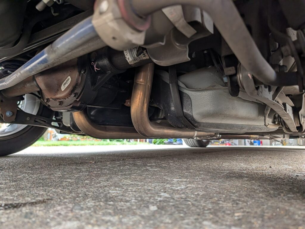 Mustang undercarriage, exhaust, and transmission inspected from below in Portland, Oregon