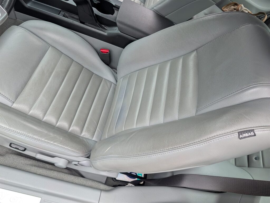 Light leather front seats and interior trim checked during a Springfield car inspection