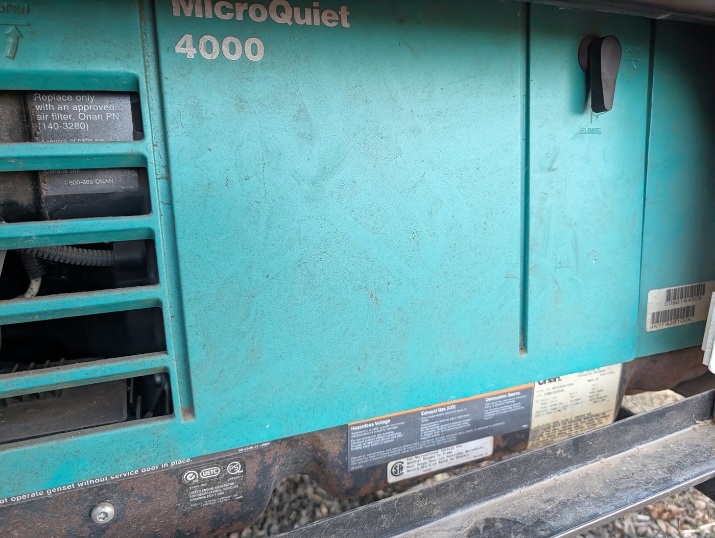 Onboard Onan generator checked as part of a motorhome systems inspection